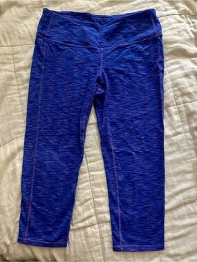 Women’s athletic Athleta Medium Capri Leggings in Royal Blue/ Purple